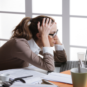Stressed business owner dealing with burnout from running their small business