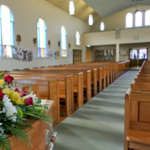 Large funeral parlor prepared for a service by funeral directors