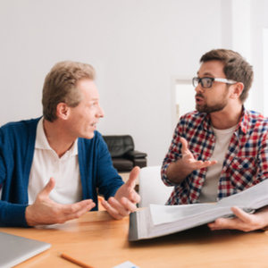 Small business employees arguing and needing conflict resolution in the workplace