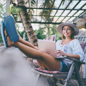 Women working during small business owner vacation